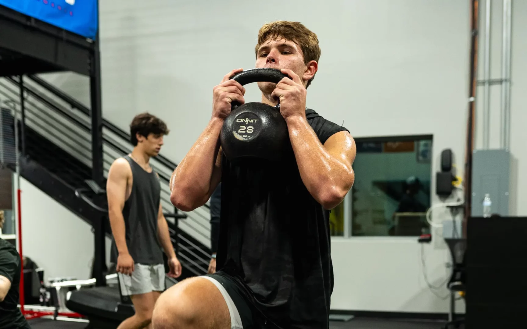 man with kettlebell